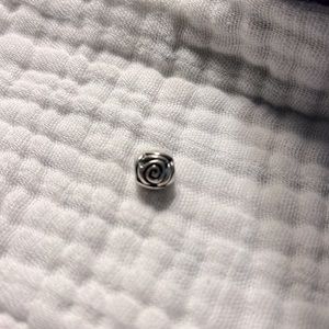Pandora rose charm.